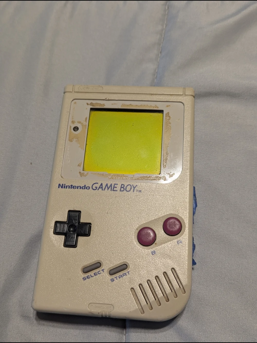 Nintendo Game Boy Portable in Cream with Purple Buttons